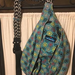 Kavu rope sling bag turquoise with funky flowers